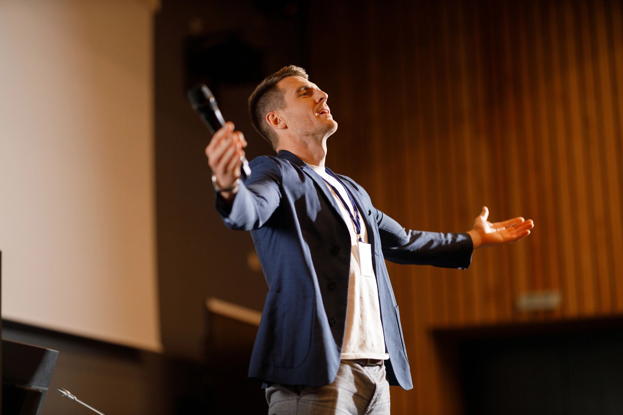 professional speaker on stage conference